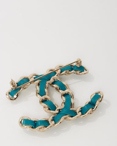 Chanel Silver Metal and Turquoise Blue Leather and Pearl Interwoven CC Logo Brooch