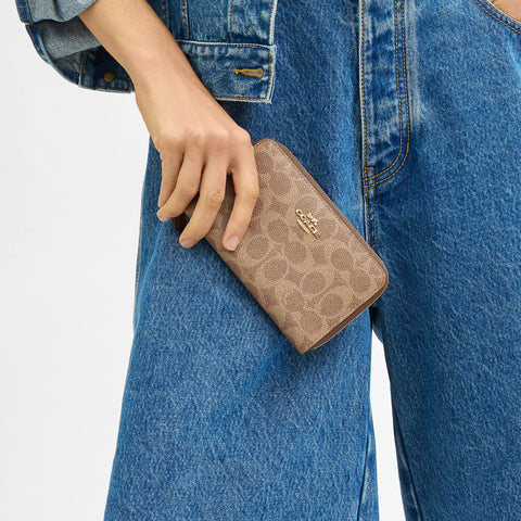 Coach Outlet Medium Id Zip Wallet In Signature Canvas